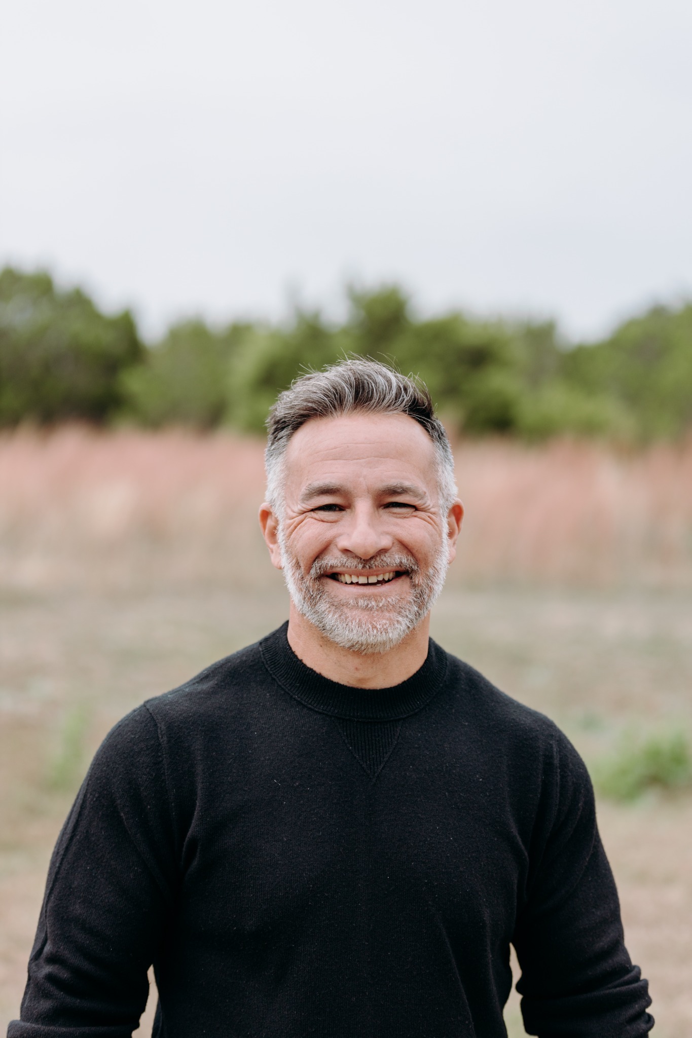 Dustin Sample smiling outdoors